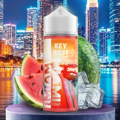 E-liquide Key West pastèque fraîche devant skyline nocturne de Miami avec fruits et glaçons E-liquide Key West pastèque fraîche devant skyline nocturne de Miami avec fruits et glaçons