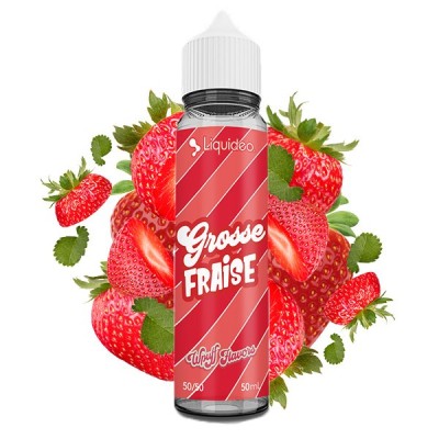 Flacon e-liquide Grosse Fraise Liquideo avec fraises fraîches et feuilles vertes Flacon e-liquide Grosse Fraise Liquideo avec fraises fraîches et feuilles vertes